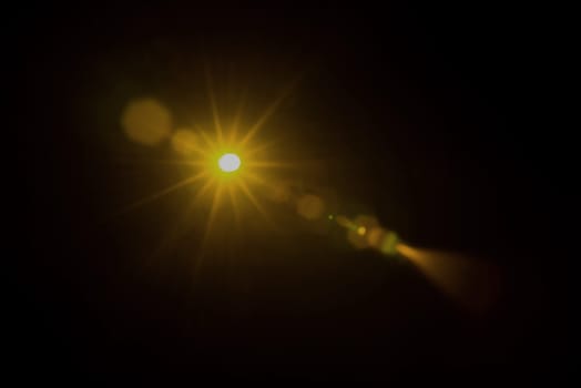 Abstract Natural Sun flare on the black.
