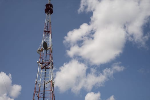 Telecommunication towers include of radio microwave and television antenna system with cloud blue sky .