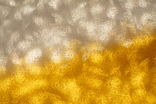 Christmas background. Festive abstract background with bokeh defocused lights and stars.