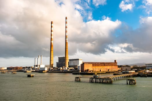 DUBLIN, IRELAND - MARCH 03 2019: Poolbeg power station in the harbour.