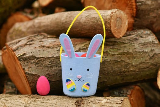 Bunny-shaped bag for finding chocolate eggs for Easter in garden