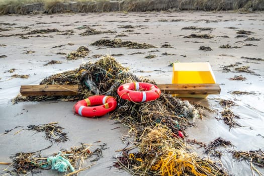NARIN, PORTNOO, IRELAND - JANUARY 15 2020 : Ringbuoy lying on Portnoo beach in County Donegal after storm Brendan.