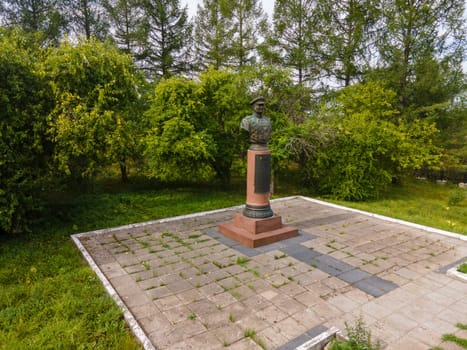 Shabby metal monument of Konev in motherland place on ground located in green park