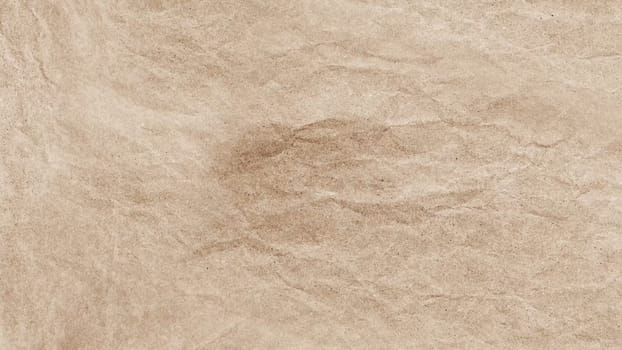 Crumpled paper texture. Abstract background. Light cream color. High quality photo
