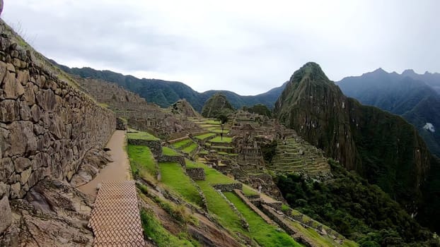 Panoramic view of the iconic machu picchu, the historic inca citadel in the andes