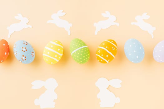 Easter eggs bunny and rabbit white paper cut isolated on pastel background copy space, Funny decoration, Creative composition banner web design holiday background, Happy Easter Day, flat lay top view