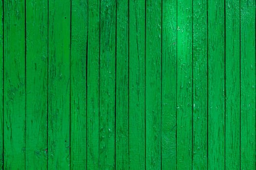 green paint wooden planks fence texture.