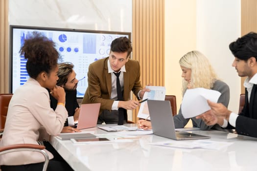 Portrait of professional smart business team discussion about start up project. Group of skilled businesspeople planing, brainstorming, sharing idea strategy. Discussion business meeting. Ornamented.