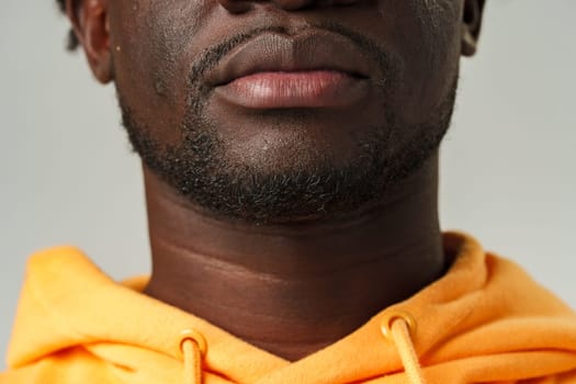 Close-Up of African Mans Lower Face and Lips studio shot