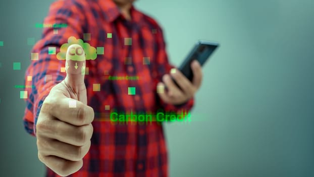Man pointing Carbon credit icon, Carbon credit market concept, Carbon Neutral in industry Net zero emission eco energy, CO2 reducing icon on global earth decrease CO2 or carbon dioxide emission.
