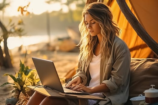 A girl in nature with a laptop. High quality photo