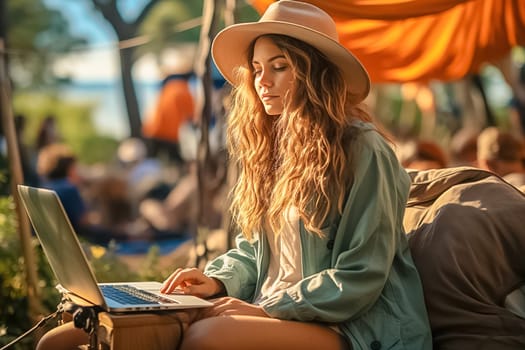 A girl in nature with a laptop. High quality photo