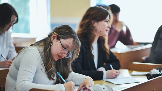 High school students sitting at a desk