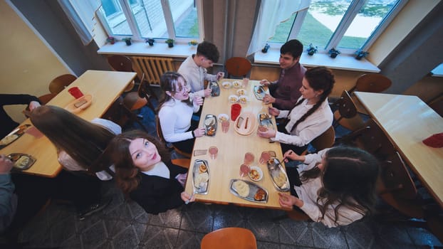 Children eat in the school canteen