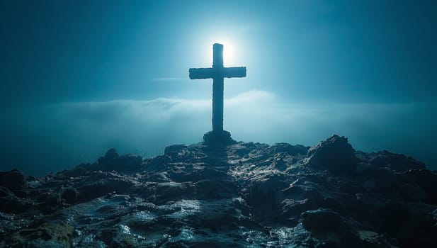 Cross on the rock in the misty night.