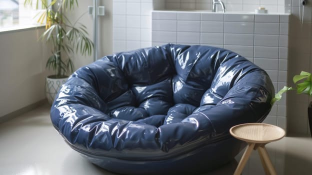 A blue bean bag chair sitting in a bathroom next to the sink