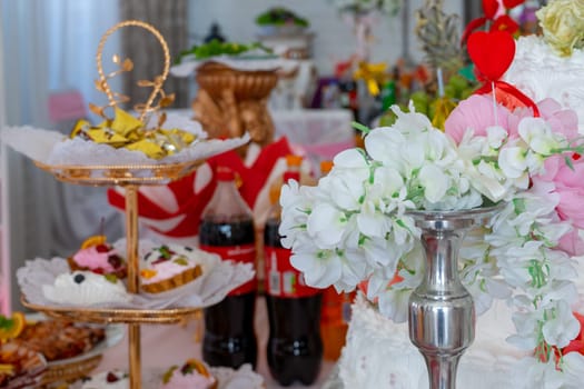 Wedding table decoration in the banquet hall. Ukraine, Vinnytsia, August 10, 2021