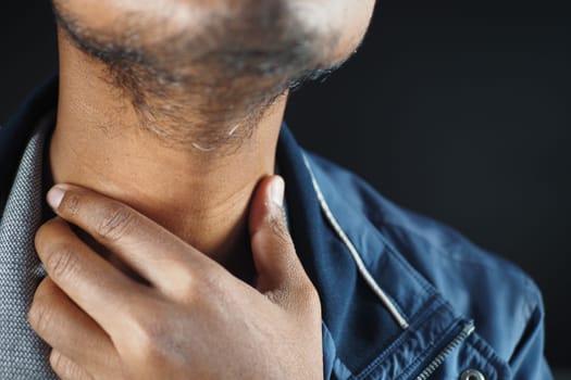 unrecognized man suffering throat pain close up .