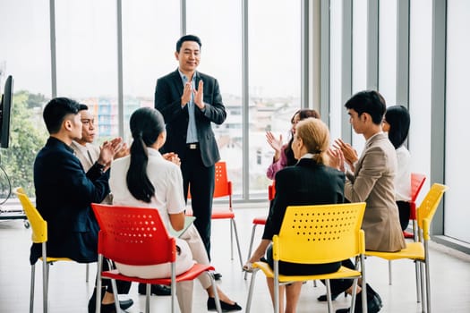 Diverse professionals collaborate in a modern office, engaged in a business meeting. They talk, brainstorm, and present, emphasizing teamwork, leadership, and successful discussions.