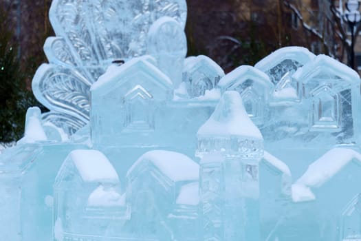 Snow sculpture, frozen in a dynamic and action-packed pose.