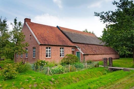 Cozy german house. Old german country red house.