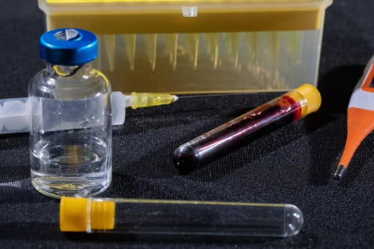 Each blood vial is transported to the laboratory for specialized tests.