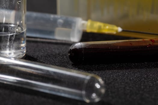 Each blood vial is transported to the laboratory for specialized tests.