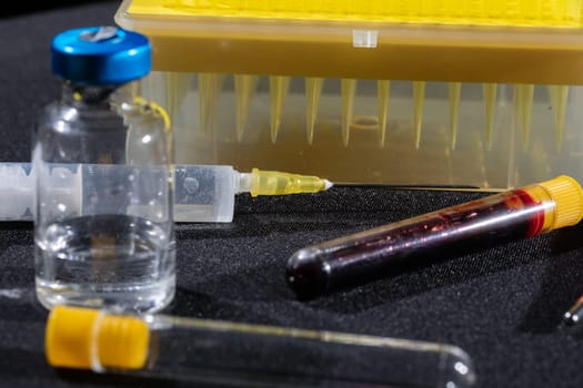 Each blood vial is transported to the laboratory for specialized tests.