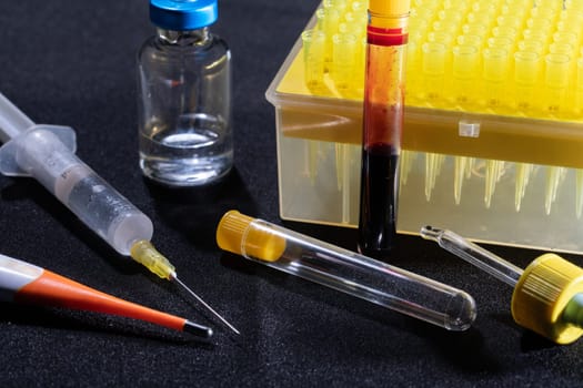 Each blood vial is transported to the laboratory for specialized tests.