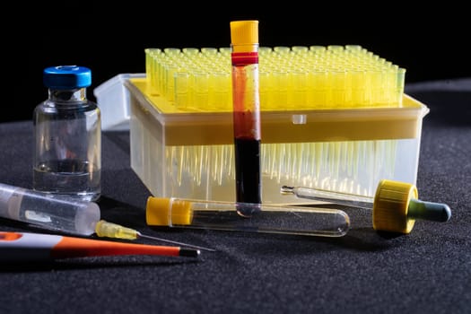 Each blood vial is transported to the laboratory for specialized tests.
