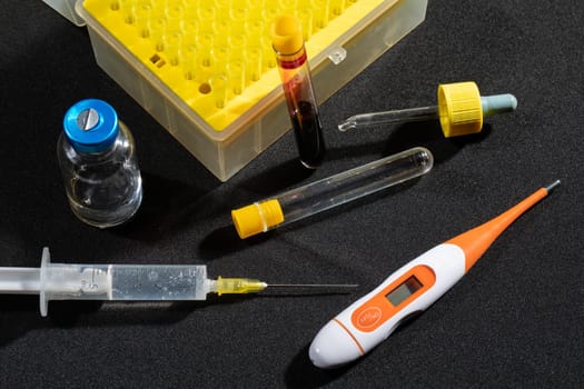 Each blood vial is transported to the laboratory for specialized tests.