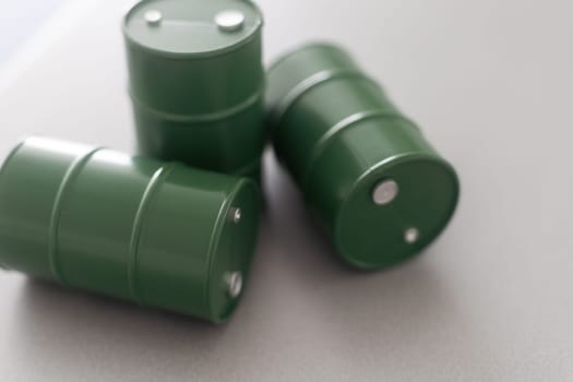Oil barrel model on the table. High quality photo