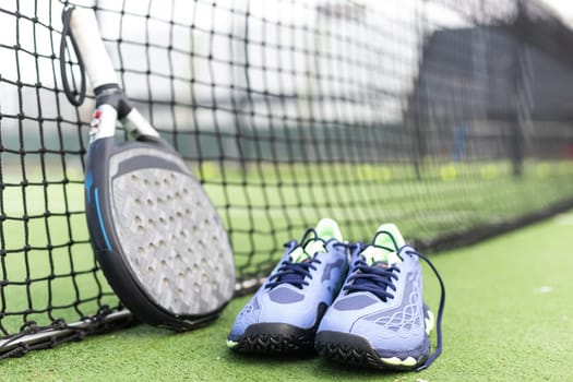 Paddle tennis objects and court. High quality photo