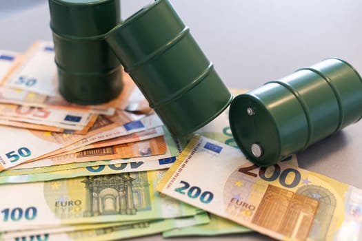 euro banknotes and oil barrel concept photo. High quality photo