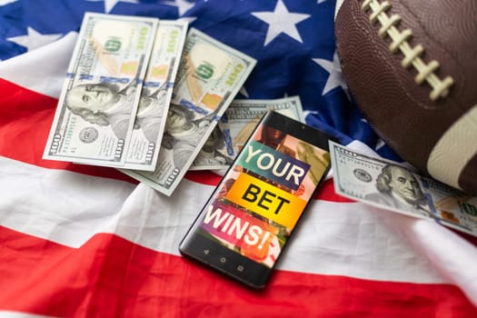rugby ball and dollars with usa flag and smartphone bet. High quality photo