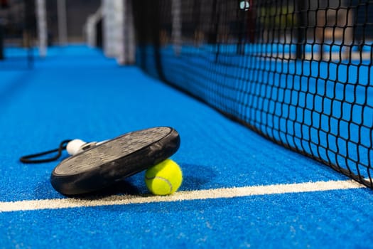 Paddle objects on blue turf. High quality photo