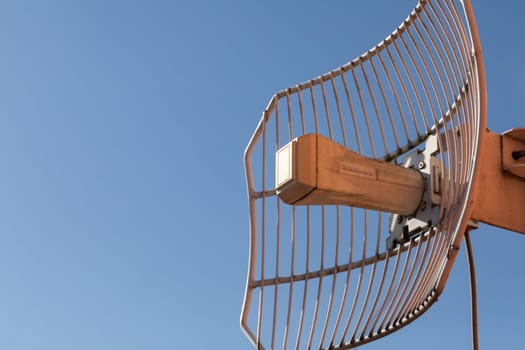 A special openwork antenna used in the telecommunications industry as well as cellular networks and wireless Internet. Technology of digital sending and receiving of data packets.