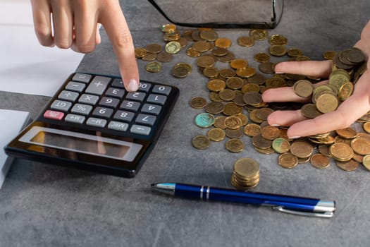 Accurate counting of every penny using a calculator while expenses are increasing.
