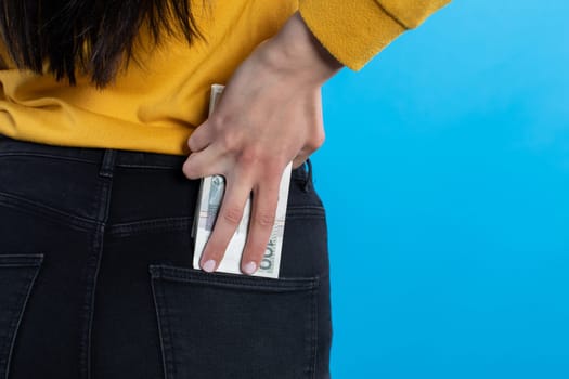 A cash file in the back pocket is a sign of financial wealth.