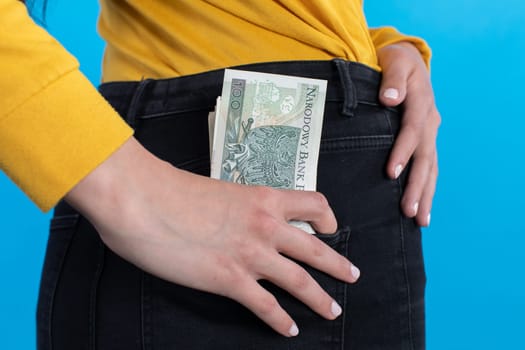 A cash file in the back pocket is a sign of financial wealth.