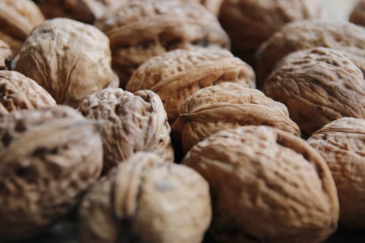 Healthy food. Walnuts on a old vintage kitchen table.