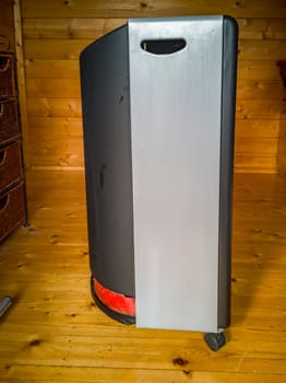 Mobile gas heater with bottle for camping.