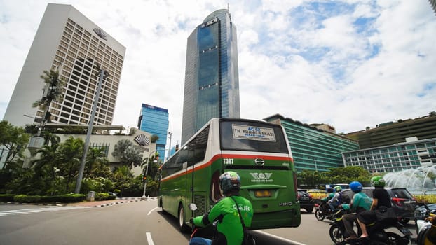 The streets and skyscrapers of the metropolis and capital of Indonesia.