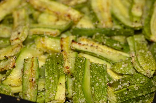 close-up baked zucchini baked in the oven 4