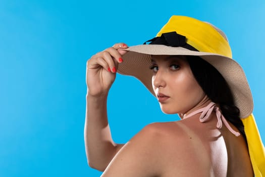 A young woman enjoys the holiday sun on vacation.