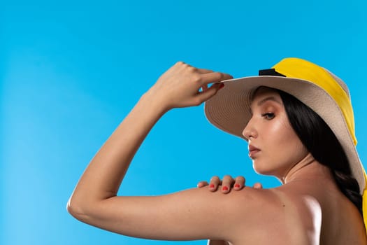 A young woman enjoys the holiday sun on vacation.