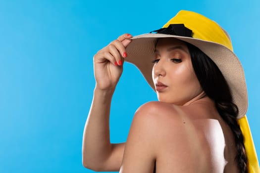 A young woman enjoys the holiday sun on vacation.
