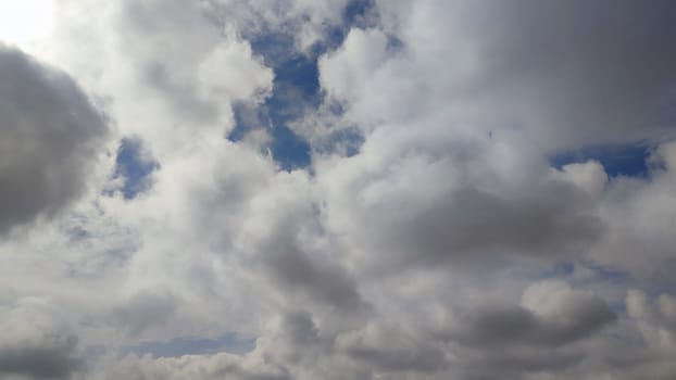 Blue gray light sky nature white clouds whether background . High quality photo