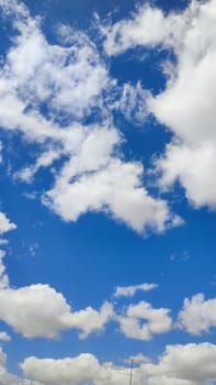 Blue gray light sky nature white clouds whether background . High quality photo