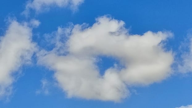 Blue gray light sky nature white clouds whether background . High quality photo